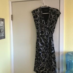 Women’s wrap around knee-length dress